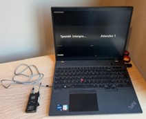 Laptop connected to English channel